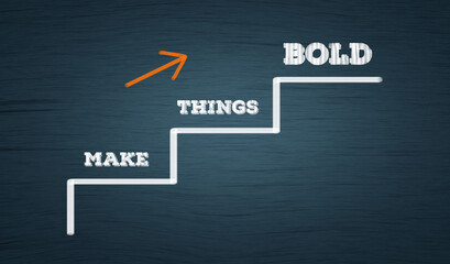 Make Things Bold  - Business growth and improvement concept. upward stair and arrow in blue chalkboard with words "Make things bold" 
