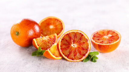 red juicy orange fruit and leaf