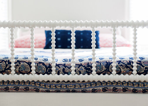 White antique spindle bed