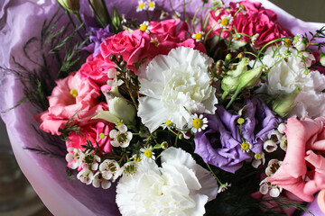 Beautiful luxury spring bouquet of mixed flowers. The work of the florist. Romantic concept. Close up. Spring banner. Easter and spring greeting card. Woman day concept. Copyspace for text.