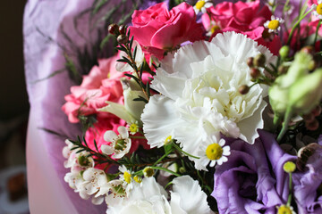 Beautiful luxury spring bouquet of mixed flowers. The work of the florist. Romantic concept. Close up. Spring banner. Easter and spring greeting card. Woman day concept. Copyspace for text.