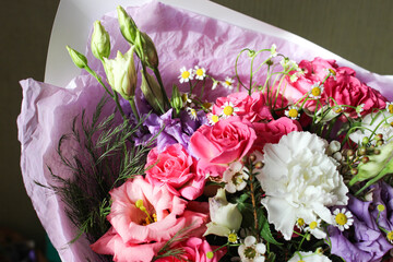 Beautiful luxury spring bouquet of mixed flowers. The work of the florist. Romantic concept. Close up. Spring banner. Easter and spring greeting card. Woman day concept. Copyspace for text.