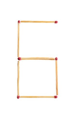 Fototapeta premium Number 6 made of matches on white background