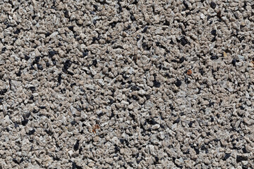 Crushed granite stones wall - close up