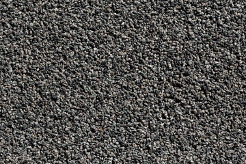 Crushed granite stones wall - close up