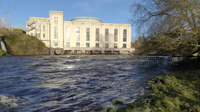 Water released from the turbines at Tongland Power Station on the River Dee