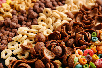 Heap of tasty breakfast cereals as background