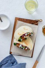 Falafel in pita with tomatoes, cucumbers, onions and spinach. Healthy eating. Vegetarian food.
