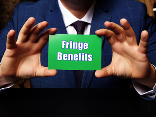 Conceptual photo about Fringe Benefits with written phrase green business card.