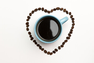 cup of coffee in the heart of grains