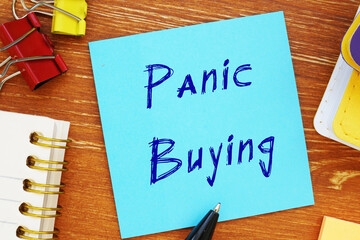 Business concept meaning Panic Buying with phrase on the sheet.