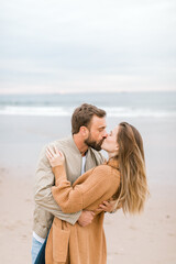 Obraz premium Engagement proposal at beach in Playa Del Rey, California Young Couple