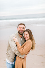 Obraz premium Engagement proposal at beach in Playa Del Rey, California Young Couple