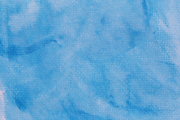 Blue watercolor on art paper background.