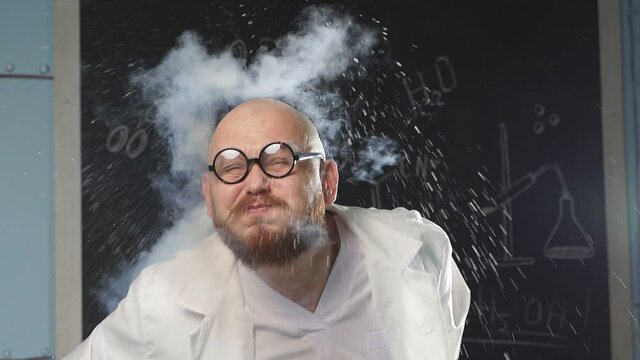 People show experiments with a smoking liquid, a crazy chemist uses liquid nitrogen. Slow motion.