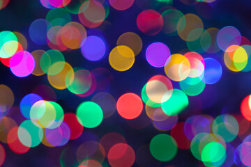 Colorful abstract background, carnival lights in bokeh.Festive blurry background