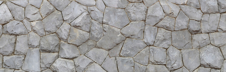 Panorama stone wall for background.