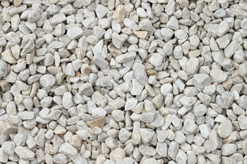 Background, texture of white crushed stone. Use for decorating garden plantings.