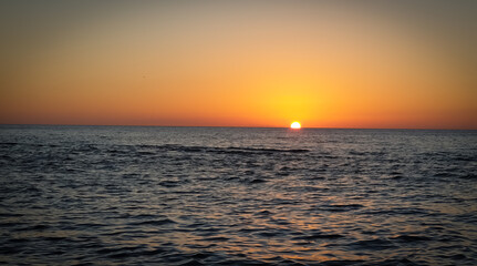 Sunset landscape with vivid colors of sun