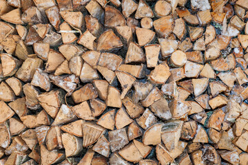 Lots of stacked wood.  Prepare for the winter. Firewood background
