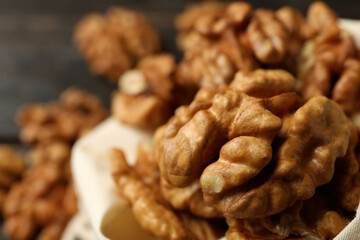 Tasty walnuts, selective focus, close up and space for text