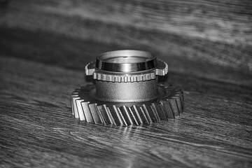 mechanical transmission gear on wooden background