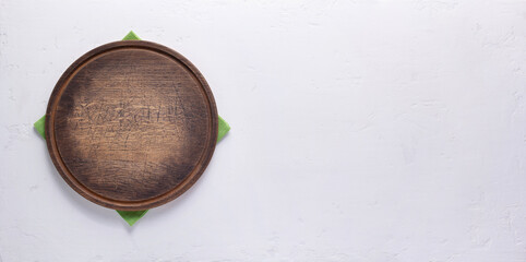 Pizza or bread cutting board for homemade baking on table. Food recipe concept at stone background texture