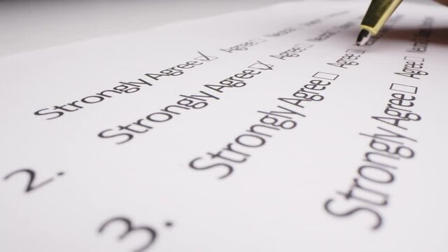 Motorized moving shot of completing a questionnaire, shot with macro probe lens