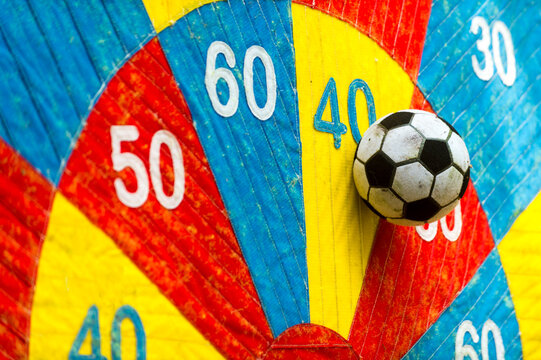 Close-up Of Big Darts With Soccer Ball