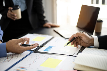 The atmosphere in the conference room was attended by four businessmen, a joint company operating brainstorming meeting for business growth, business management concepts.