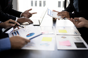 The atmosphere in the conference room was attended by four businessmen, a joint company operating brainstorming meeting for business growth, business management concepts.
