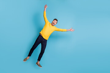Fototapeta na wymiar Full length photo of handsome person flying make star figure open mouth isolated on blue color background
