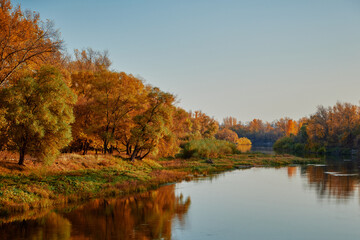 sunny autumn weather on a lake in russia