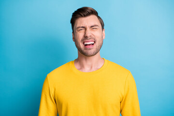 Portrait of satisfied person laughing loud look camera have great time isolated on blue color background