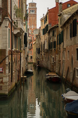 Fototapeta na wymiar Canal with boats in Venice
