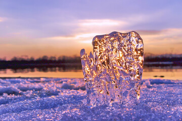 piece of ice on a sunset