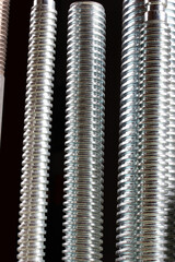 Newly manufactured large screws. Close up.