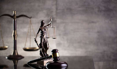Law and justice concept. Law symbols composition: judge’s gavel,  Themis  statue and scale.