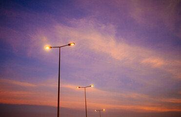 streetlights against sunset