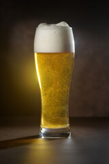 Beer.Pint of Beer close up isolated on abstract background. Cold Craft light Beer in a glass