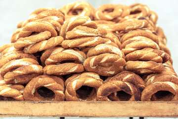 Street counter with traditional Turkish bread Simit. Fresh morning white Turkish pastry.