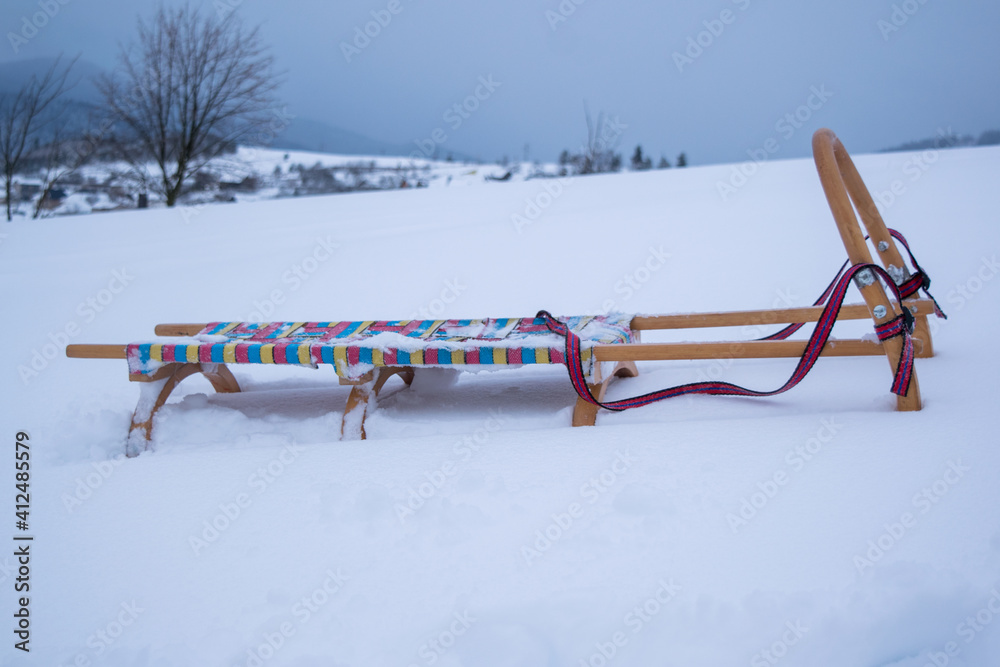 Poster Sledge in deep snow