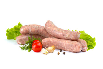 Raw pork sausages. Grilled sausages, spices close-up, isolated on a white background.Selective focus.
