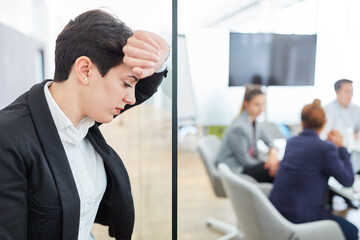 Tired business woman having a headache