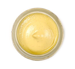 Mustard sauce in glass jar isolated on white background, top view