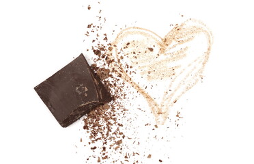 Chocolate pieces and grated flakes, shavings with heart symbol isolated on white background, top view