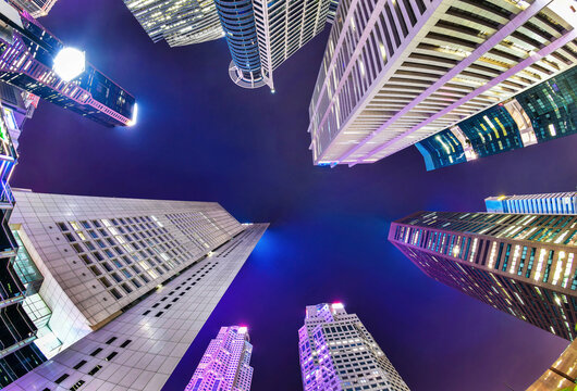 Low Angle View Of Modern Buildings In City At Night