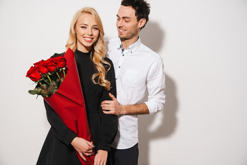 Lovely romantic young happy couple celebrating