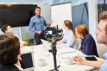 Business people at live streaming business meeting