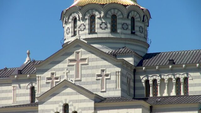 Vladimir Cathedral in Khersones towers on high hill. Cathedral Church of Simferopol and Crimean Diocese of Moscow Patriarchate in Khersones. Close-up. Sevastopol, Crimea, Russia. May 2015: